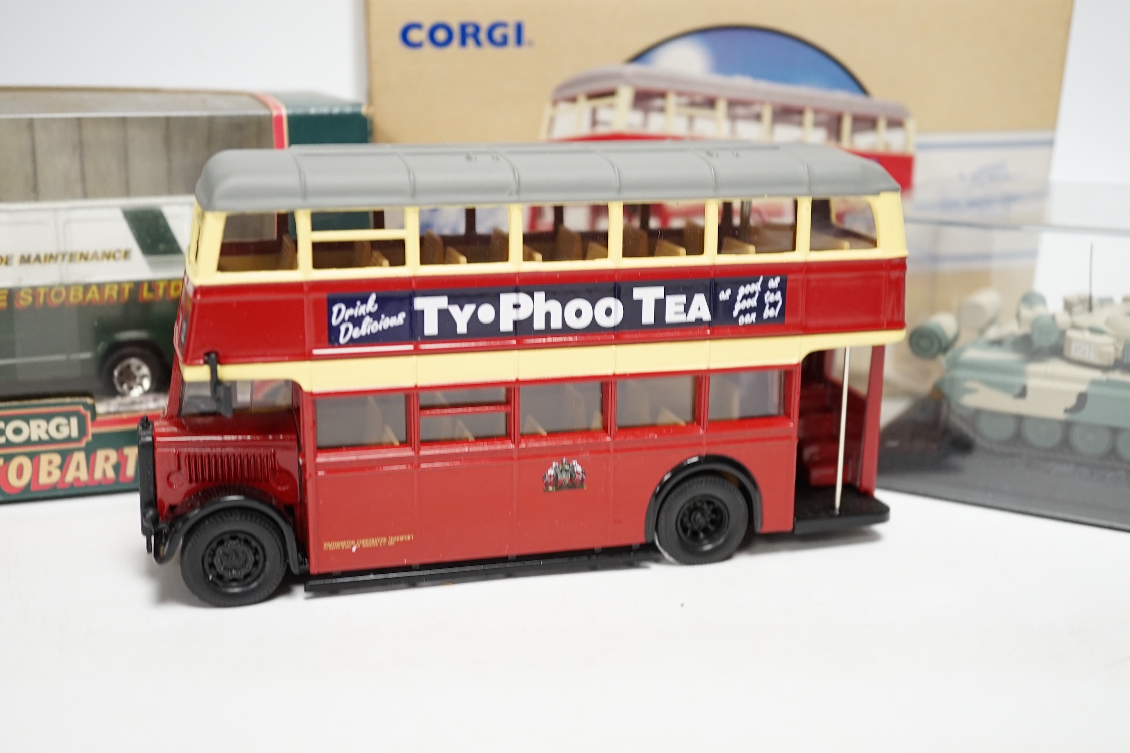 Eight boxed Corgi toys and two other die-cast models including; Eddie Stobart commercial vehicles, two Guy Arab buses, two double deck trams, etc.